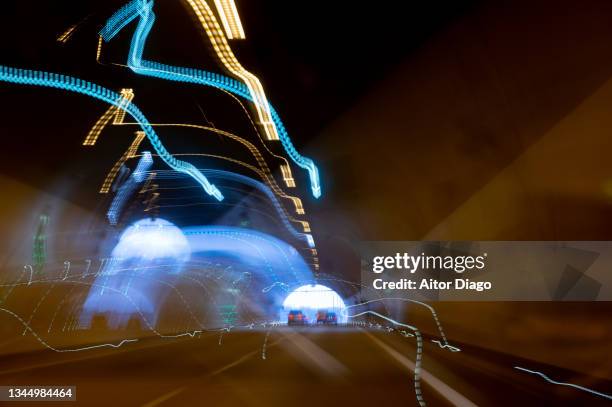 moved image inside a tunnel with traffic. - graphic accident photos stock pictures, royalty-free photos & images