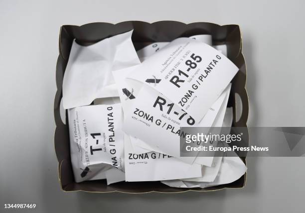 One of the baskets where taxpayers deposit their appointment number in one of the tables of attention, of an office of the State Agency of the Tax...