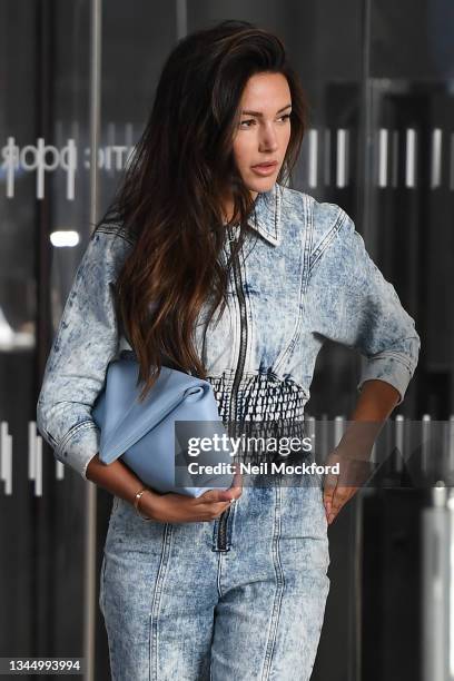 Michelle Keegan seen leaving an interview at Virgin Radio before returning to her hotel on October 05, 2021 in London, England.