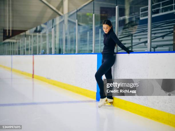 figure skater in training - ice skate indoor stock pictures, royalty-free photos & images