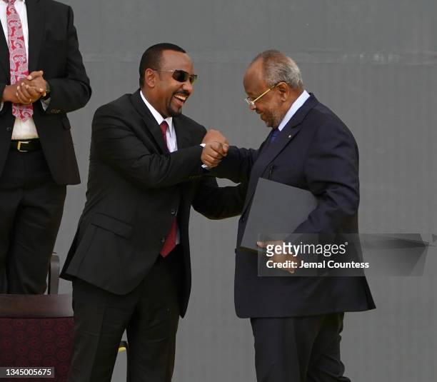 Prime Minister of Ethiopia Abiy Ahmed greets Ismail Omar Guelleh, President of Djibouti during an inaugural celebration after Abiy Amhed was sworn in...