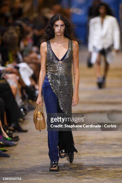 Model walks the runway during the Louis Vuitton Womenswear Spring/Summer 2022 show as part of Paris Fashion Week on October 05, 2021 in Paris, France.