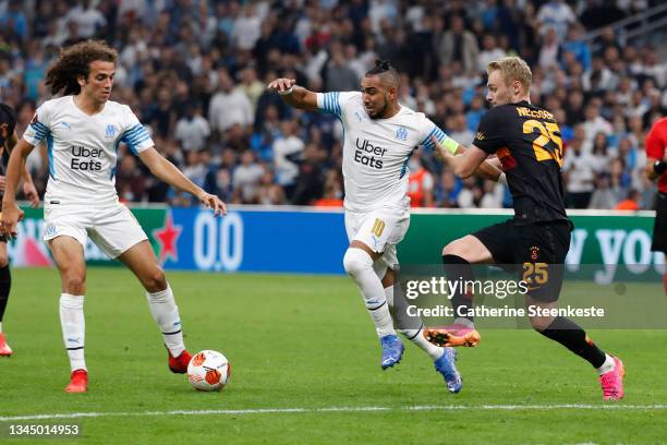 Victor Nelsson of Galatasaray AS challenges Dimitri Payet and Matteo Guendouzi of Olympique de Marseille during the UEFA Europa League group E match...