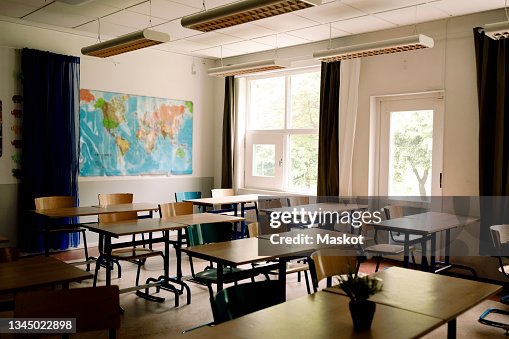 Desks and chairs arranged in classroom at high school Desks and chairs arranged in classroom at high school