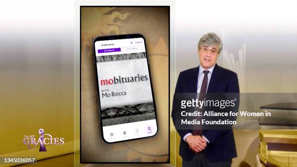 In this screengrab, Mo Rocca accepts the award for Best Podcast - Entertainment at the 46th Annual Gracie Awards on October 05, 2021.