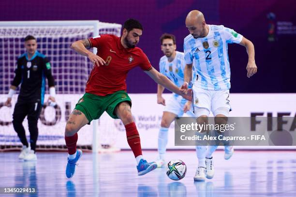 Erick of Portugal battles for possession with Damian Stazzone of Argentina during the FIFA Futsal World Cup 2021 Final match between Argentina and...