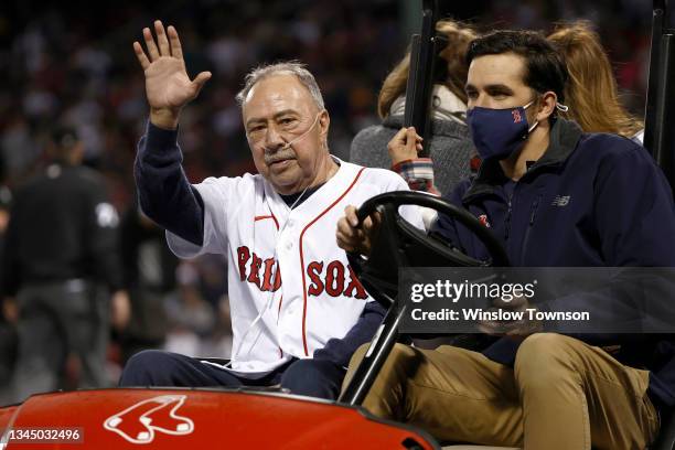 Jerry Remy, the Boston Red Sox broadcaster, waves to fans before throwing the ceremonial first pitch during the American League Wild Card game...