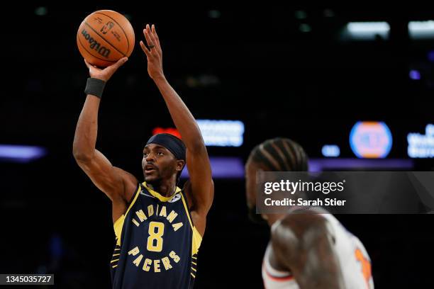 Justin Holiday of the Indiana Pacers shoots the ball during the first