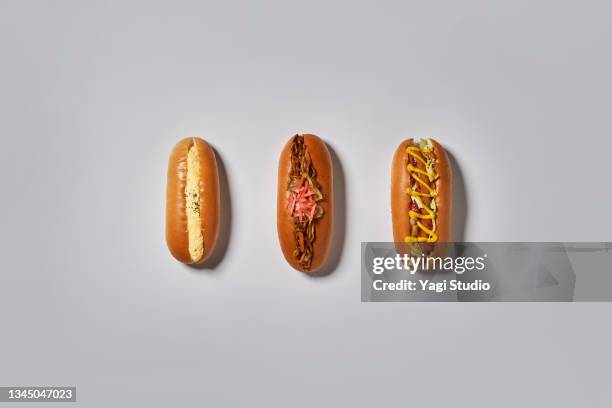hot dogs, yakisoba bread, and egg bread knooling style - side dish stock pictures, royalty-free photos & images