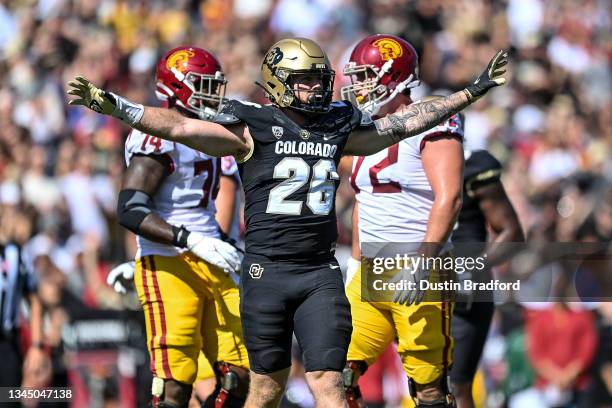 Linebacker Carson Wells of the Colorado Buffaloes celebrates after a defensive stop against the USC Trojans in the first quarter of a game at Folsom...