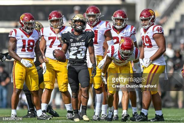 Running back Jarek Broussard of the Colorado Buffaloes walks back to the line of scrimmage after a rush against the USC Trojans during a game at...