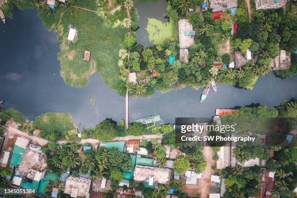 drone photo of a local village in bangladesh - bangladesh aerial stock pictures, royalty-free photos & images