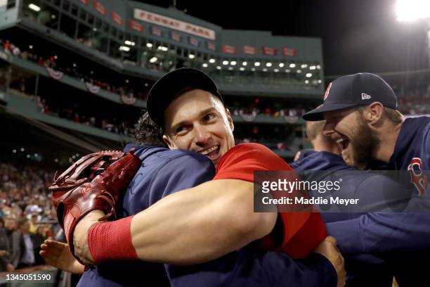 Enrique Hernandez and Chris Sale of the Boston Red Sox react after beating the New York Yankees 6-2 of the American League Wild Card game at Fenway...