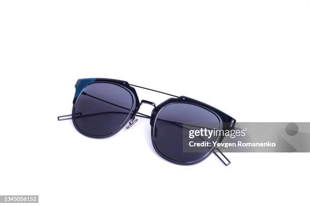 blue sunglasses isolated on white background - occhiali da sole foto e immagini stock