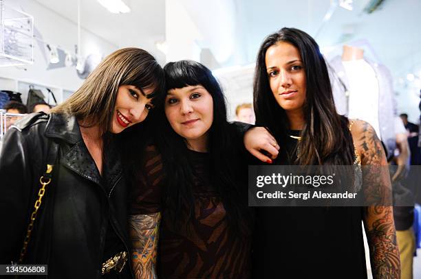 Luiza Darosa, Ali Buatti and Giulia Vallotto attend the GQ & Diesel Art Basel kick-off party featuring La Pandilla held at Diesel Store on December...