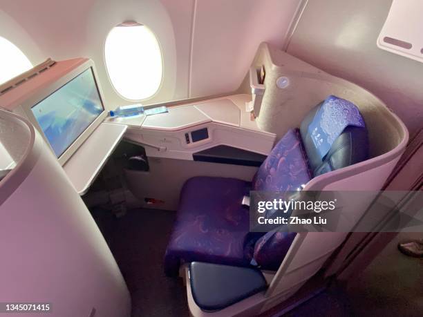 the business cabin view of air china's airbus 350-900 - airbus concept cabin stock pictures, royalty-free photos & images