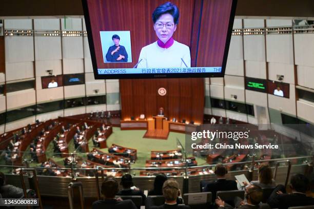 Screen shows Hong Kong Chief Executive Carrie Lam Cheng Yuet-ngor delivering her policy address at the Legislative Council on October 6, 2021 in Hong...