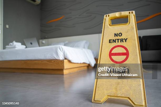 signs no entry place on the floor in hotel room. - backstage sign stock pictures, royalty-free photos & images