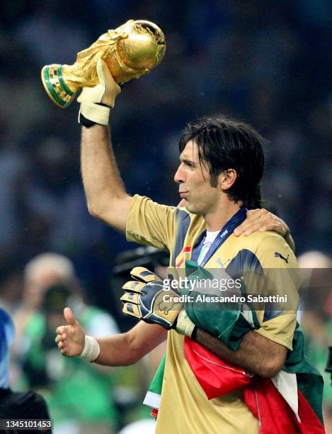 Gianluigi Buffon of Italy celebrates the victory with the trophy at the end the World Cup 2006 final football game Italy and France, 09 July 2006 at...