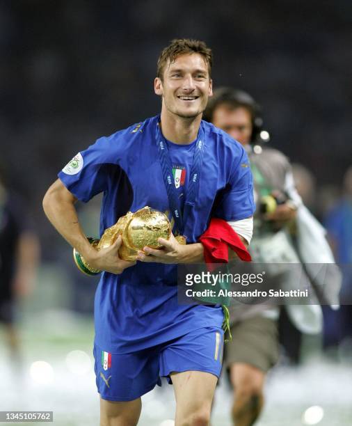Francesco Totti of Italy celebrates with the trophy at the end the World Cup 2006 final football game Italy and France, 09 July 2006 at Berlin...