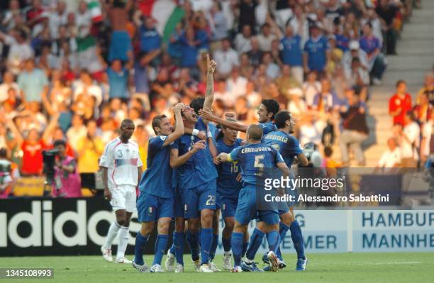 Marco Materazzi of Italy celebrates with teammates after scoring the 1-1 goal during the World Cup 2006 final football game Italy and France, 09 July...