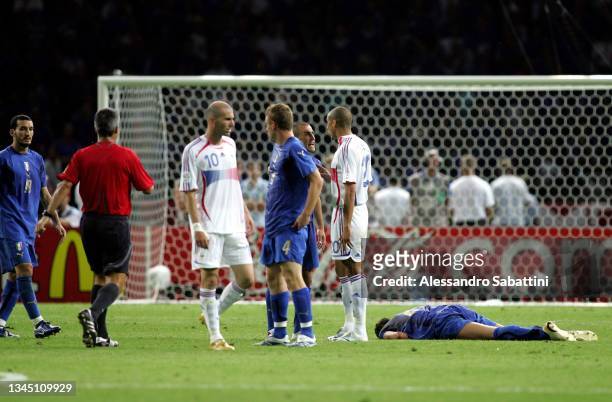 Marco Materazzi of Italy on the ground injured after receiving a head from Zinedine Zidane of France during the World Cup 2006 final football game...