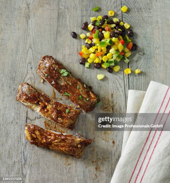 spare ribs with a bean and sweetcorn salad - side salad stock pictures, royalty-free photos & images