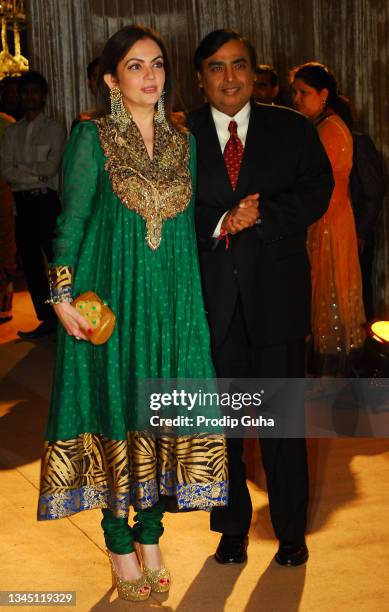 Nita Ambani and Mukesh Ambani attend the wedding reception of Dhiraj Deshmukh and Deepshikha Bhagnani on February 28, 2012 in Mumbai, India.