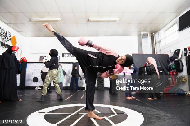 two women boxing in gym - femalefocuscollection stock pictures, royalty-free photos & images