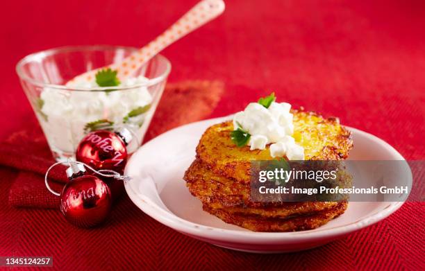 potato and pumpkin fritters with a cucumber and cream cheese dip - protein pancakes stock pictures, royalty-free photos & images