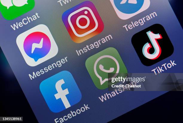 In this photo illustration, the logos of social media applications, Messenger, Instagram, Facebook, WhatsApp and TikTok is displayed on the screen of...