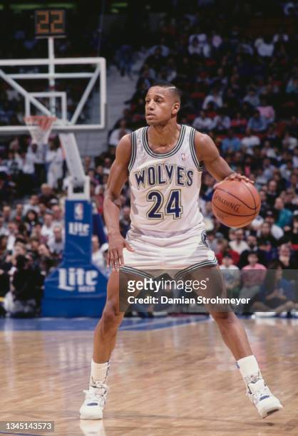 Pooh Richardson, Point Guard for the Minnesota Timberwolves dribbles the basketball down court during the NBA Midwest Division basketball game...