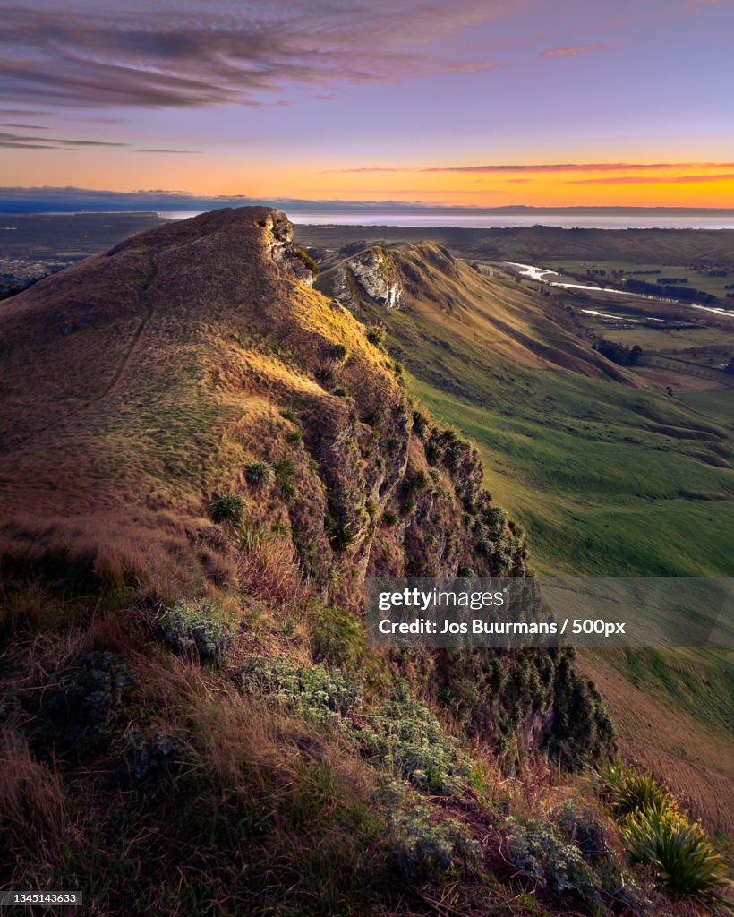 Scenic view of landscape against sky during sunset,Tuki Tuki,New Zealand