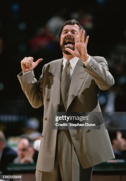 Carlesimo, Head Coach for the Portland Trail Blazers makes hand signals to his players during the NBA Midwest Division basketball game against the...