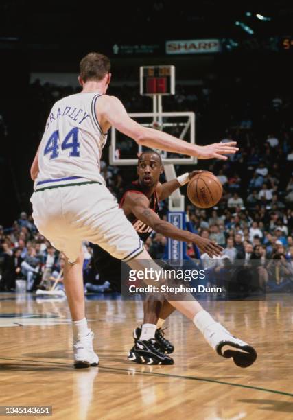 Shawn Bradley, Center for the Dallas Mavericks moves to block Kenny Anderson, Point Guard for the Portland Trail Blazers during their NBA Midwest...