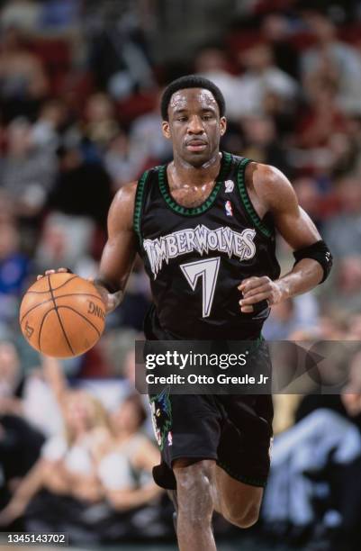 Terrell Brandon, Point Guard for the Minnesota Timberwolves dribbles the basketball down court during the NBA Midwest Division basketball game...
