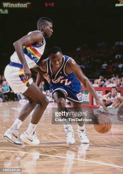 Mitch Richmond, Shooting Guard for the Sacramento Kings dribbling the basketball during the NBA Midwest Division basketball game against the Denver...