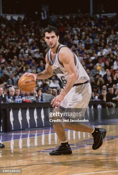 Peja Stojakovic from Croatia and Small Forward for the Sacramento Kings dribbles the basketball down court during the NBA Pacific Division basketball...