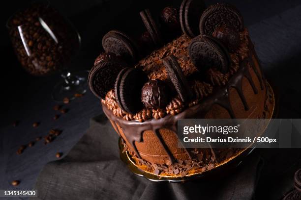 high angle view of chocolate cake on table - süßwaren stockfoto's en -beelden