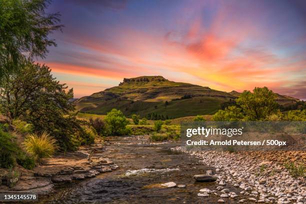 scenic view of landscape against sky during sunset,underberg,south africa - kwazulu natal stock pictures, royalty-free photos & images