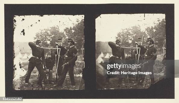 Untitled [American Soldiers Posing With Weapons]