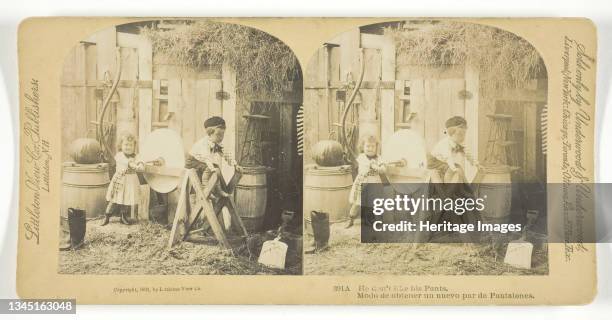 He don't like his Pants, 1891. [Method of obtaining a new pair of trousers - girl winding the handle of a grinding wheel as a boy presses the seat of...