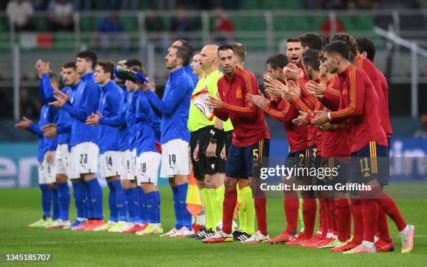 Sergio Busquets of Spain applauds with team mates after the national anthem prior to the UEFA Nations League 2021 Semi-final match between Italy and...