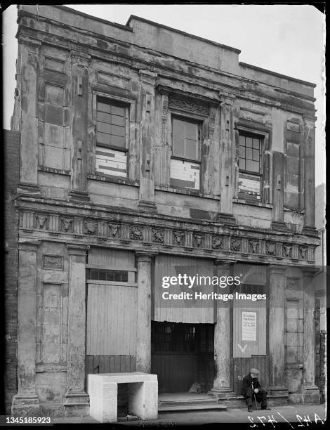 St Anne's School, Alcester Street, Deritend, Digbeth, Birmingham, 1941. An old man seated outside St Anne's School, Alcester Street. The headmaster's...