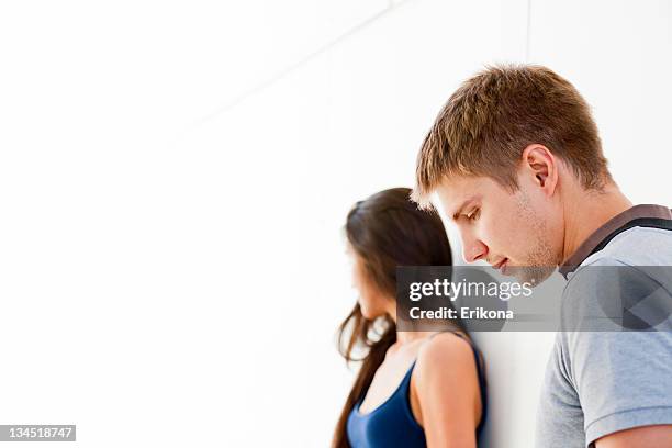 close-up of young couple in conflict - sad gay person stock pictures, royalty-free photos & images