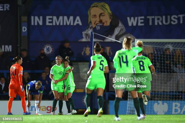 Tabea Wassmuth of VfL Wolfsburg celebrates with Svenja Huth after scoring their side's first goal during the UEFA Women's Champions League group A...