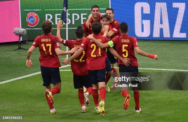 Ferran Torres of Spain celebrates with team mates after scoring their side's second goal during the UEFA Nations League 2021 Semi-final match between...