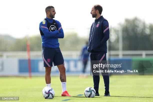 Kyle Walker talks to Manager Gareth Southgate during a training session at St Georges Park on October 06, 2021 in Burton-upon-Trent, England.