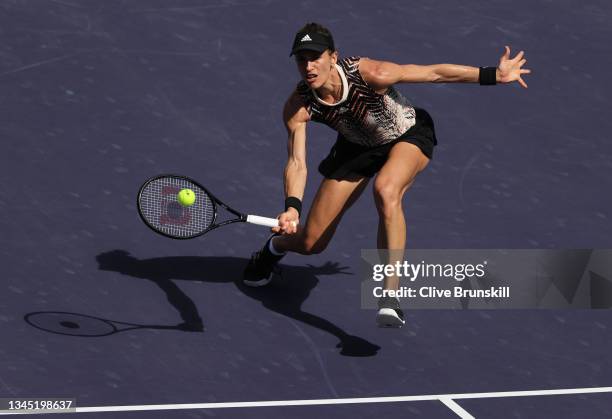 Andrea Petkovic of Germany plays a forehand volley against Yulia Putintseva of Kazakhstan during their first round match on Day 3 of the BNP Paribas...