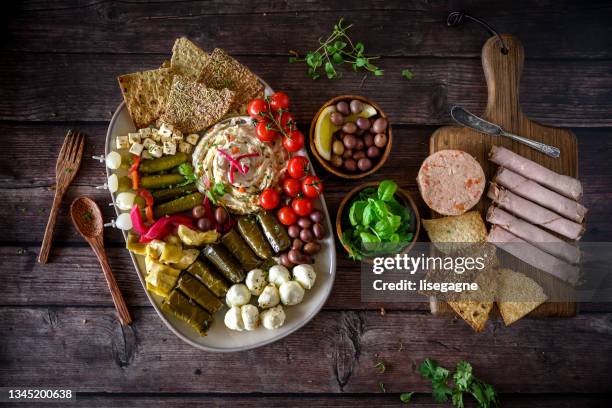 charcuterie board - rustic plate overhead stock pictures, royalty-free photos & images